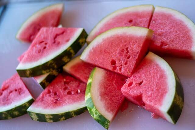 A watermelon sliced into pieces.
