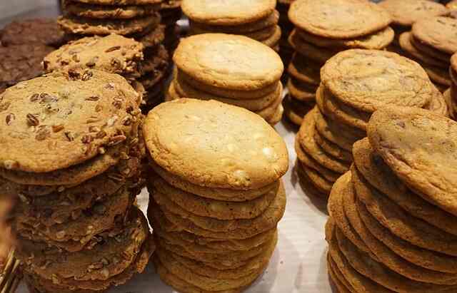 Stacks of oatmeal and oatmeal and raisin cookies.