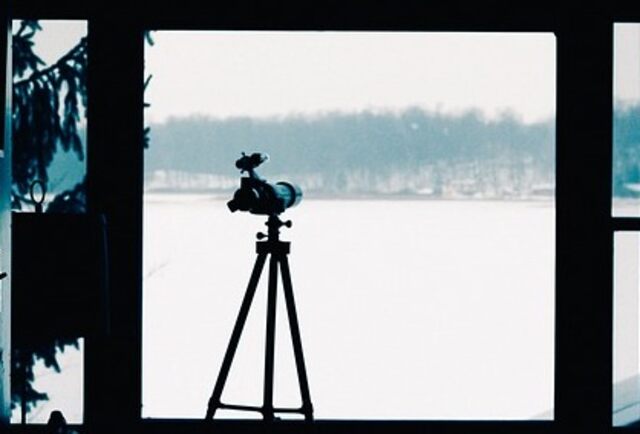 A spotting scope pointing outside.