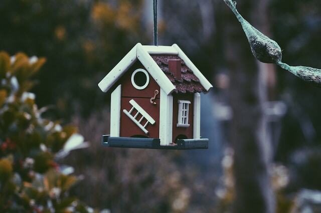 A Swedish birdhouse in a garden.