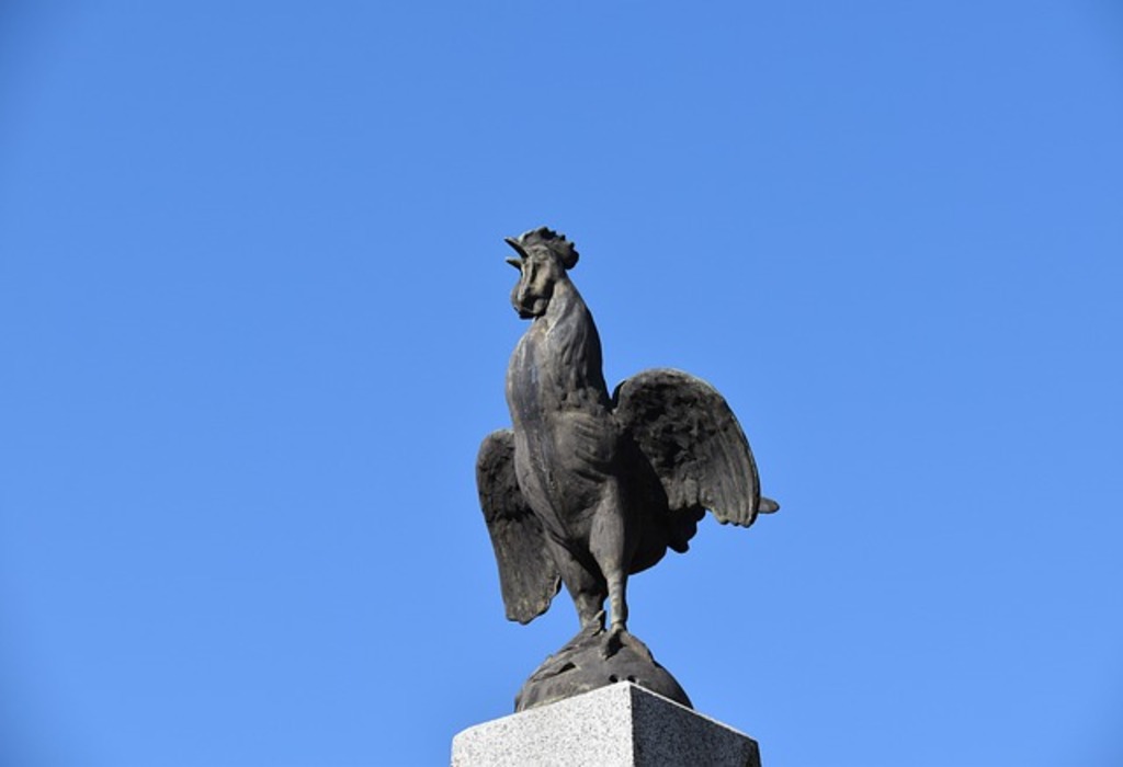 A statue of a rooster. The national bird of France.